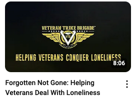 Veteran Trike Brigade logo with the tagline 'Helping Veterans Conquer Loneliness' on a dark background. The video is titled 'Forgotten Not Gone: Helping Veterans Deal With Loneliness' and has a duration of 8:06.